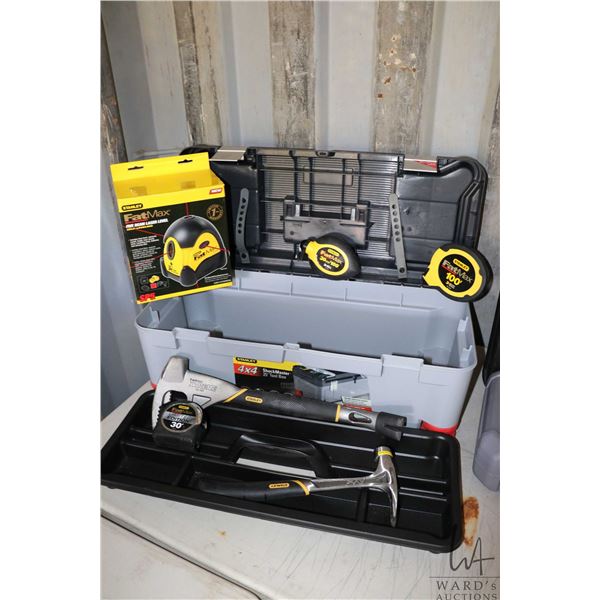 Stanley tool box and contents including Stanley Fatmax 5 beam laser level, three Fatmax tape measure