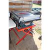 Image 1 : Bosch 4000 10" table saw w/ Bosch 1000 folding stand and a cased set of Delta 8" stacking dado blade