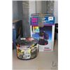 Image 1 : Flotec sump pump (appears new in box) and a garden hose