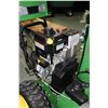 Image 9 : John Deere 1330SE gas powered snow blower and fuel can. Working at time of cataloging