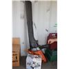 Image 1 : Black & Decker electric leaf blower and a Shark mini vacuum