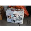 Image 2 : Black & Decker electric leaf blower and a Shark mini vacuum