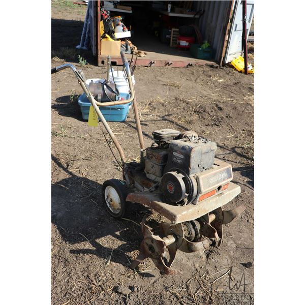 Sears roto tiller 5HP. (Note: Forward / reverse not working)