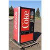 Image 1 : Coke pop machine. Set up to dispense with .25c. Working at time of cataloging