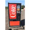 Image 2 : Coke pop machine. Set up to dispense with .25c. Working at time of cataloging