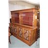 Image 1 : Antique hand carved walnut sideboard with book storage/ display shelves, each door in base features 