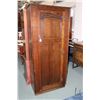 Image 1 : Antique single door quarter cut oak wardrobe with carved decoration on top of door, 69" H X 30" W X 