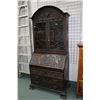 Image 1 : Antique heavily carved European three drawer drop front desk with glazed book storage top section, p