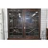 Image 3 : Antique heavily carved European three drawer drop front desk with glazed book storage top section, p
