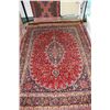 Image 1 : 100% hand made Iranian wool carpet "Mashad" with center medallion, burgundy background, overall flor
