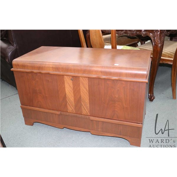 Waterfall style, cedar lined walnut blanket chest with original key and labels, made by The Honderic