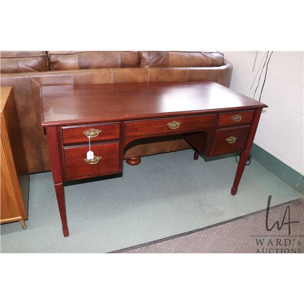 Modern computer desk with drop down keyboard drawer, file drawer and drawer made by the Bombay Compa