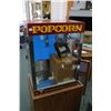 Image 7 : Cretors popcorn machine 27" H X 20" W X 14" D, in unused condition, sitting on 23" H shop made two d