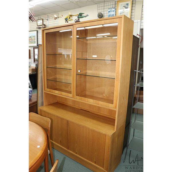 Mid century modern chest on chest sideboard with hutch, base featuring two retractable door exposiin