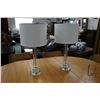 Image 1 : Pair of contemporary glass table lamps with shades and glass finials, 24" in height. Note: Not avail