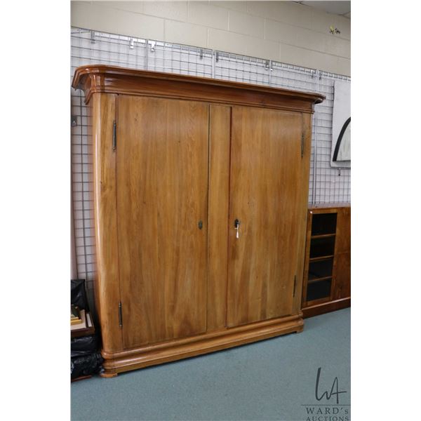 Large antique French mahogany two door armoire, fitted with shelves and had original key, 85" H X 72