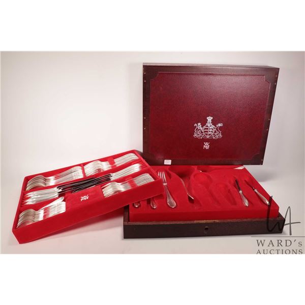 Boxed set of WMF Silco German made flatware including ten each of dinner knives, dinner forks, table