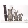Image 6 : Three antique graduated pewter lidded ewers, 5" to 10"