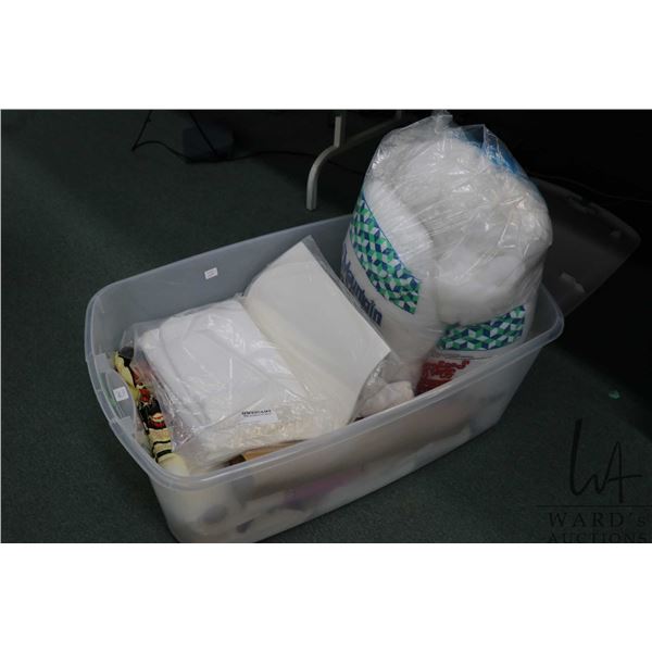 Large selection of sewing supplies including quilt filling, a variety of staplizers, needlework fabr