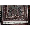 Image 2 : Small fringed scatter rug with center medallion, floral design and highlights of grey, brick and sag