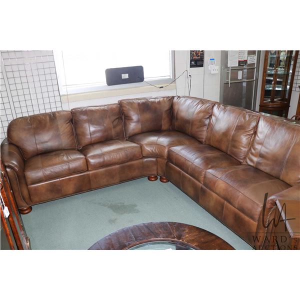 Thomasville brown leather upholstered two piece sectional, each with bun feet and decorative nail he