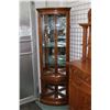 Image 1 : Semi contemporary oak and curved glass, illuminated two door corner cabinet with adjustable glass sh