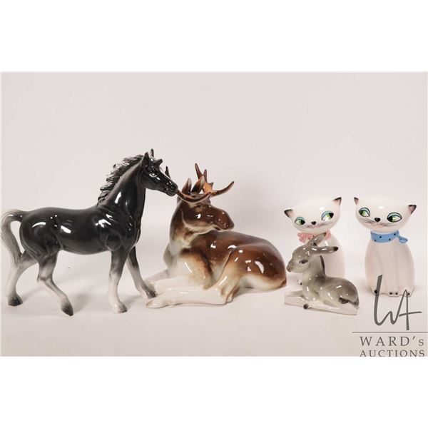 Five assorted animal figurines including Russian moose, unidentified doe, and three Japanese pieces 
