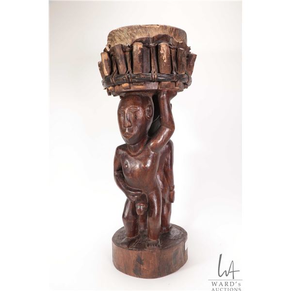 Hand carved African wooden drum with fertilty figured base 21" in height