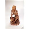 Image 3 : Hand carved African wooden figure of a woman with a pot on an open fire, 18" in height, label on und