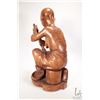 Image 5 : Hand carved African wooden figure of a woman with a pot on an open fire, 18" in height, label on und