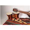 Image 3 : Vintage flat-back mandolin, a small pair of bongo drums, maracas and a woven colourful throw
