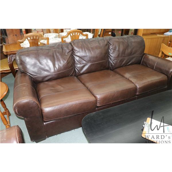 Brown leather full sized sofa with some distressing on the back, 94" long