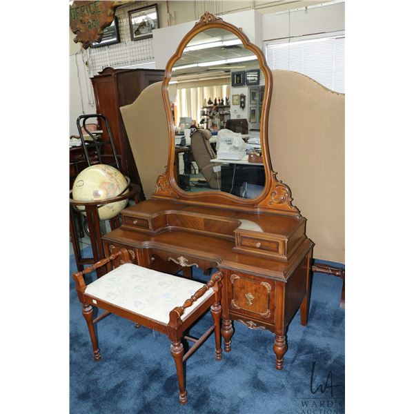 Mid 20th century mirrored walnut vanity with matching upholstered stool, 27" to top of cabinet, 71" 