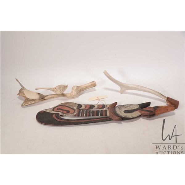 Bird motif antler carving, appears to be signed " Tuktoyartuk, N.W.T. 1974" 12" in length, a horn an