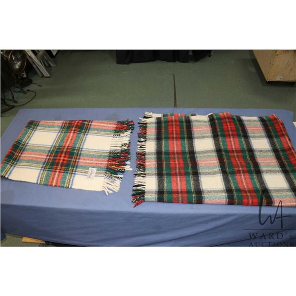 Two wool blankets including Holt Renfrew 35" X 48" and Horner 62" X 50"