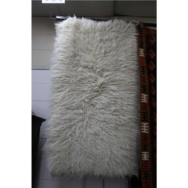 Sheep skin rug 31" X 56"