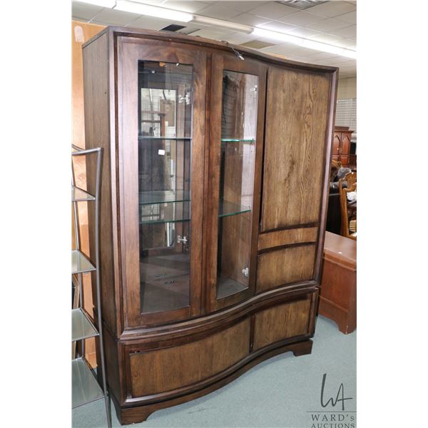 Modern illuminated curved glass display/ storage cabinet, made by Legacy Classic Furniture, 73" H X 