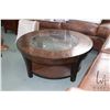 Image 1 : Modern primitive style glass top coffee table, 18" H X 40" in diameter