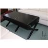 Image 1 : Semi contemporary black finish coffee table with single drawer on each end and cross supports, made 