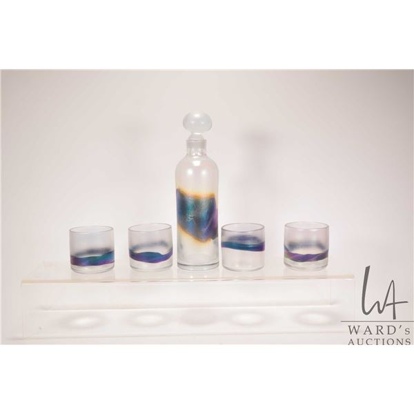 Hand blown art glass decanter and four tumblers signed "Skookum"