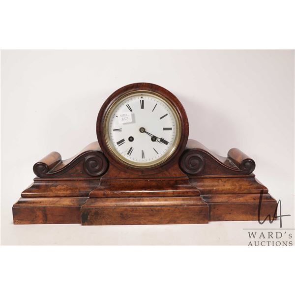 Antique French drum clock in burl walnut case. Working at time of cataloging, however nut missing th