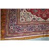 Image 2 : 100% hand made Iranian wool carpet "Tabriz" with center medallion, red background and overall floral