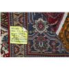 Image 3 : 100% hand made Iranian wool carpet "Tabriz" with center medallion, red background and overall floral