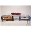 Image 1 : Three 1:18 scale die cast cars including boxed 1956 Chrysler B, 1970 Plymouth Superbird and an unbox