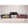 Image 1 : Three 1:18 scale die cast models including 1956 Ford Thunderbird Convertible, 1957 Ford Ranchero and
