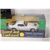 Image 2 : Three 1:18 scale die cast cars including "White Lightening" Trans Am, 1969 Pontiac Grand Prix SJ 428