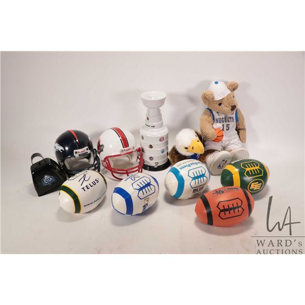 Selection of collectible including mini footballs, helmet, porcelain Stanley Cup money bank plus sma