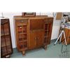 Image 1 : Antique English oak drop front secretaire with glazed door book display/ storage and carved drawer f