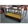 Image 1 : Antique wood and glass counter style display case with sliding glass doors and one shelf, 36" H X 60