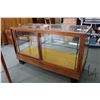 Image 4 : Antique wood and glass counter style display case with sliding glass doors and one shelf, 36" H X 60
